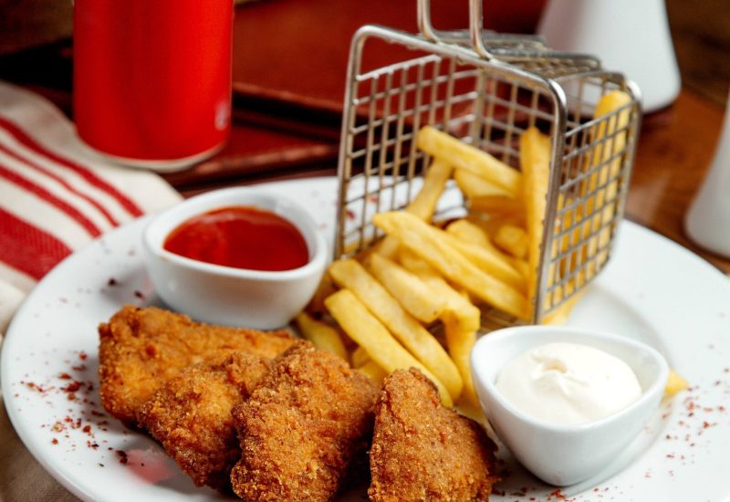 chicken nuggets served with french fries mayonnaise and ketchup